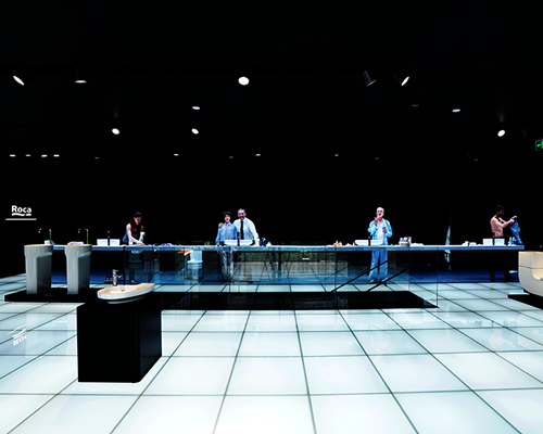 MAD projects simulations of people on LED screens inside roca beijing gallery