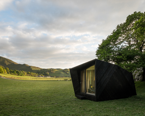 miller kendrick architects embodies welsh folklore in its ‘arthur’s cave’ compact cabin