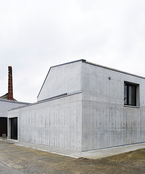 taketo tashiro extends sake-brewery with a mass-concrete complex in japan
