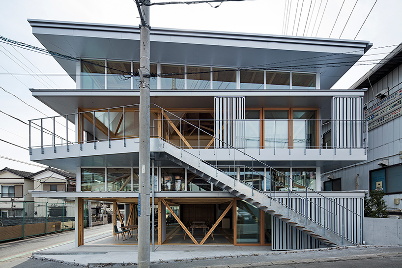 aki hamada constructs adaptable building in japan with shifting façades