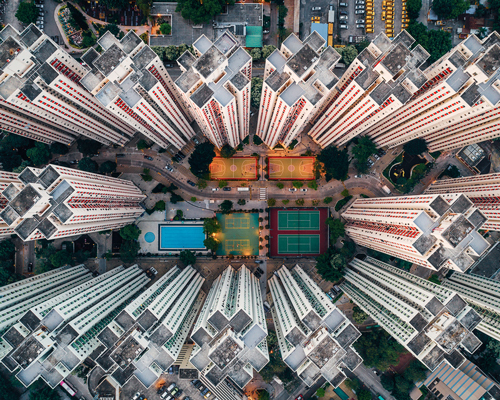 density by drone: andy yeung highlights claustrophobic living in hong kong