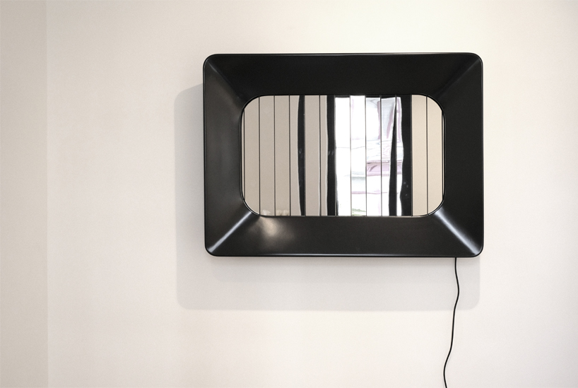 ionna vautrin's billboard mirror reflects visitors to atelier relief