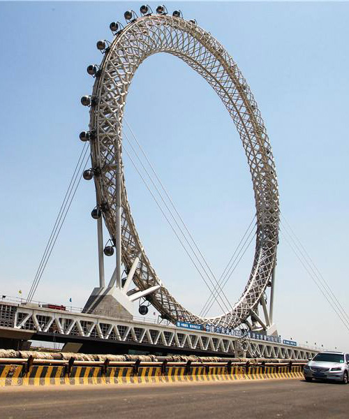 the world’s largest spokeless ferris wheel opens in shandong, china