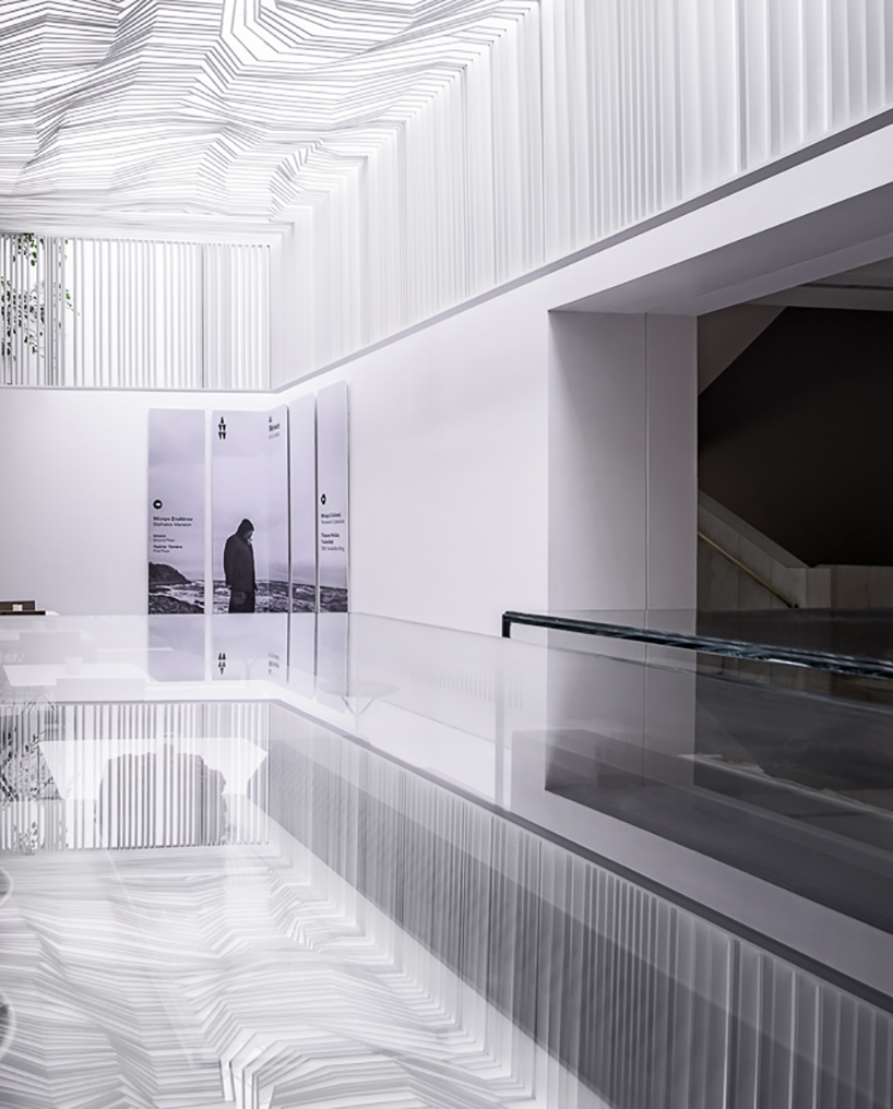 kois associated architects hang sculptural ceiling canopy over museum café in athens