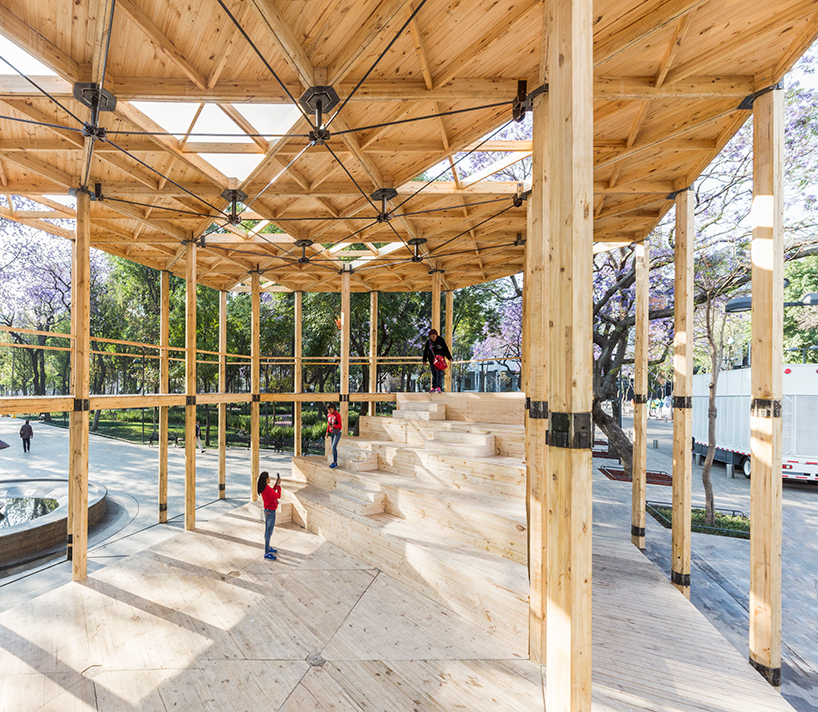 dellekamp arquitectos installs timber pavilion with triangular forms in downtown mexico city