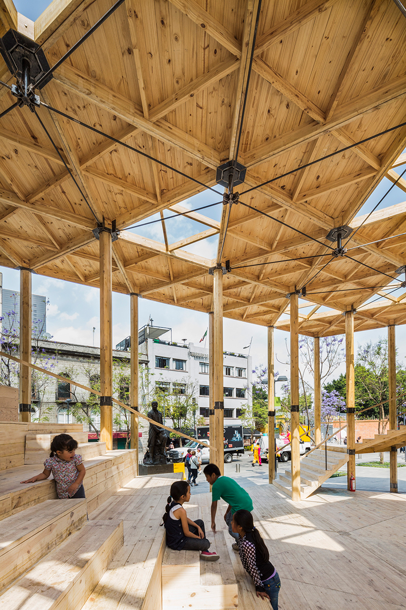 dellekamp arquitectos installs timber pavilion with triangular forms in downtown mexico city