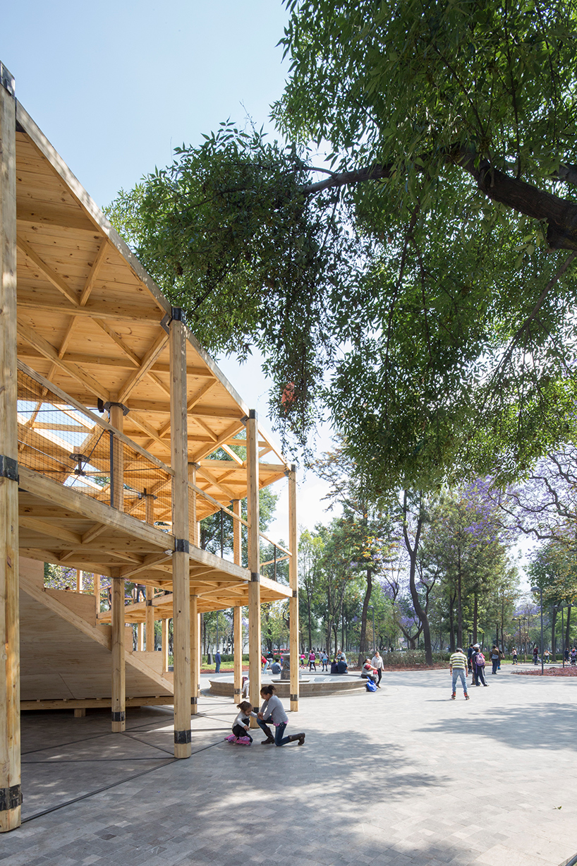 dellekamp arquitectos installs timber pavilion with triangular forms in downtown mexico city