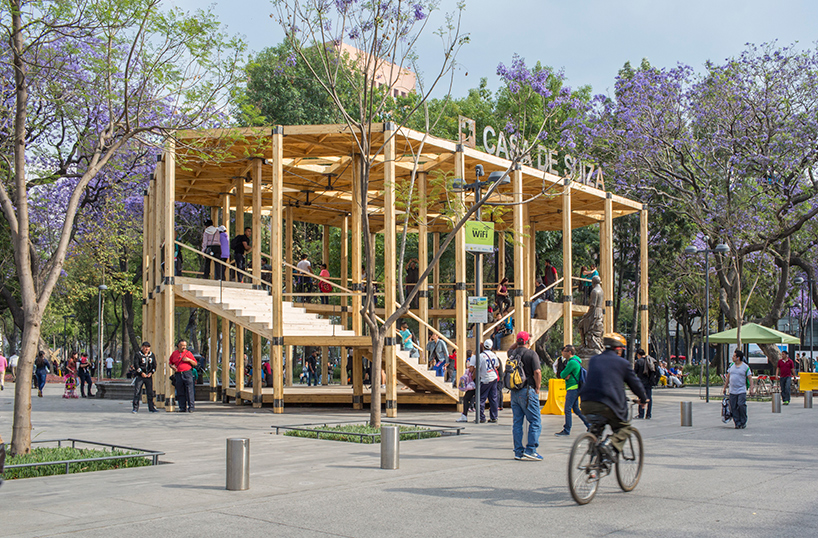 dellekamp arquitectos installs timber pavilion with triangular forms in downtown mexico city