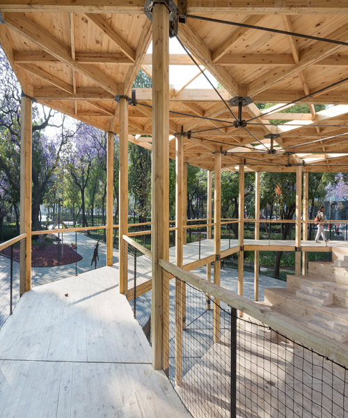 dellekamp arquitectos installs timber pavilion with triangular forms in downtown mexico city