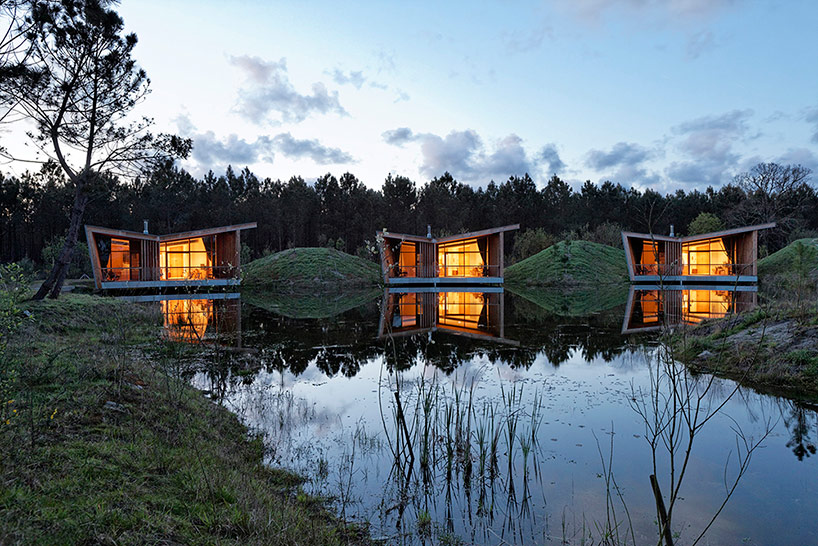 echasses eco-lodges by patrick arotcharen architecte fit within a delicate lake ecosystem