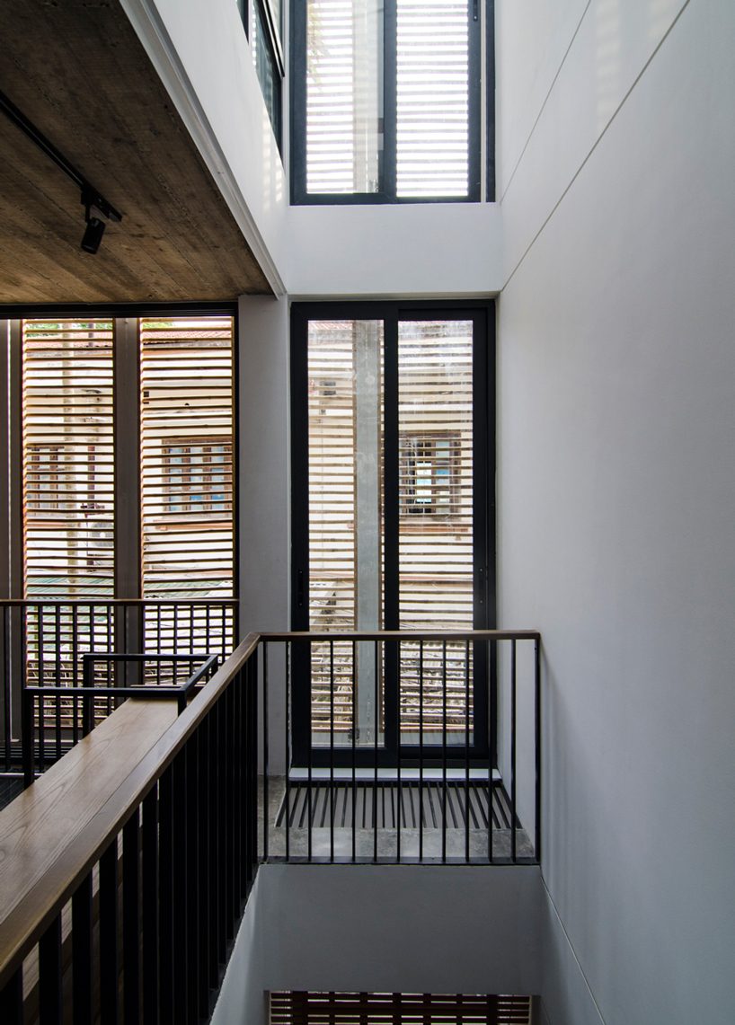 global architects realizes vertical four-storey vacation home in hanoi