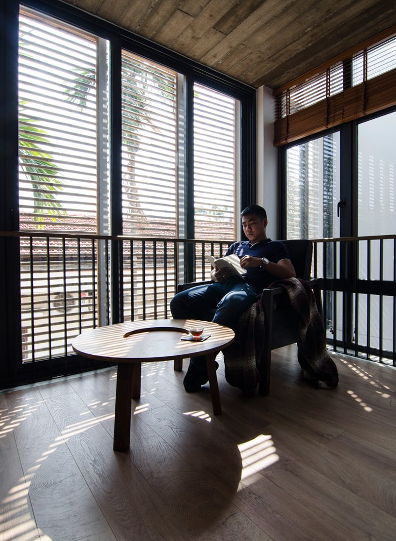 global architects realizes vertical four-storey vacation home in hanoi