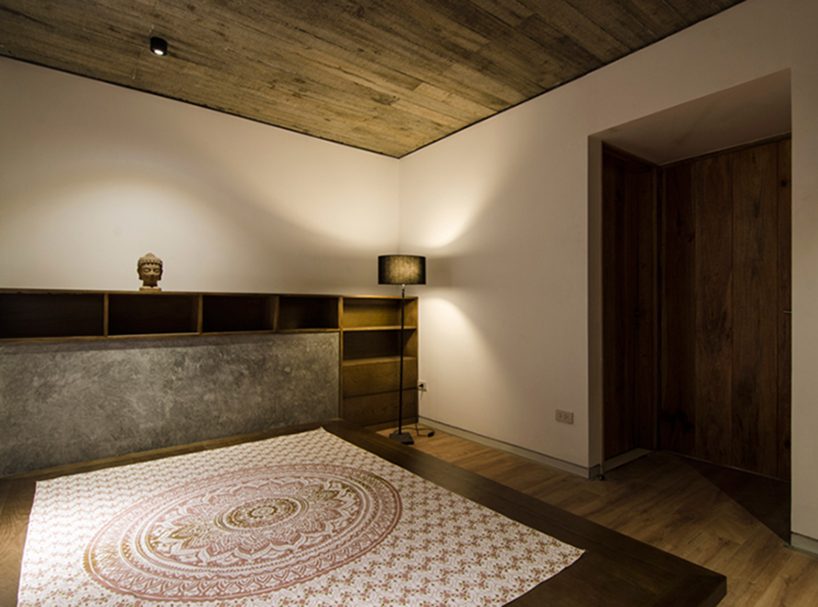 global architects realizes vertical four-storey vacation home in hanoi