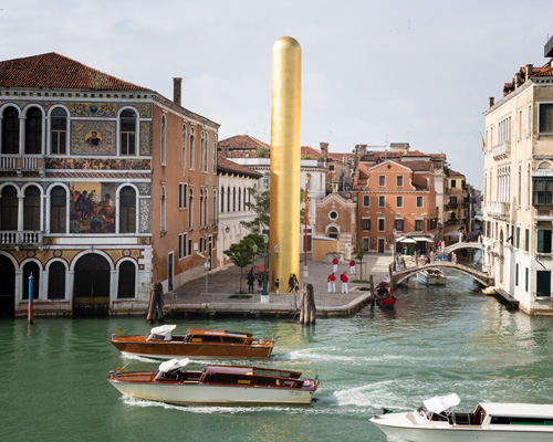 james lee byars' 20-meter-tall 'golden tower' erected along venice's grand canal