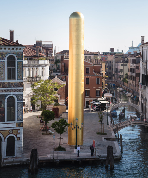 james lee byars' 20-meter-tall 'golden tower' erected along venice's grand canal