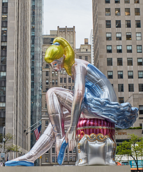 jeff koons inflates 45-foot-high seated ballerina in new york's rockefeller center