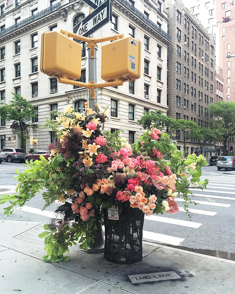 floral designer transforms NYC trash cans into bountiful bin bouquets