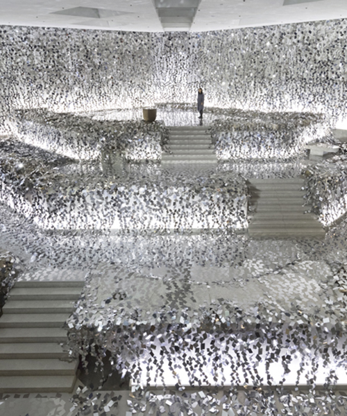 nendo drapes a kaleidoscopic 'ivy of mirrors' inside a japanese flower art school