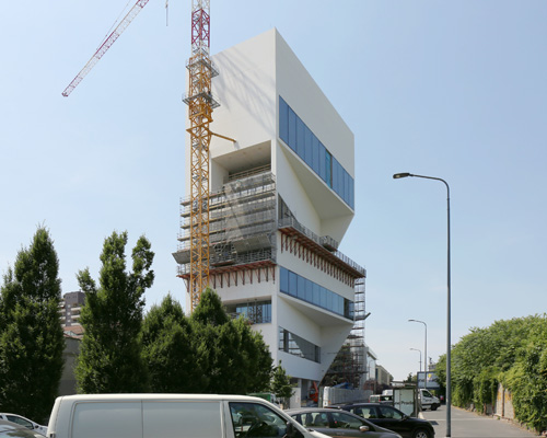 fondazione prada's new building by OMA nears completion in milan