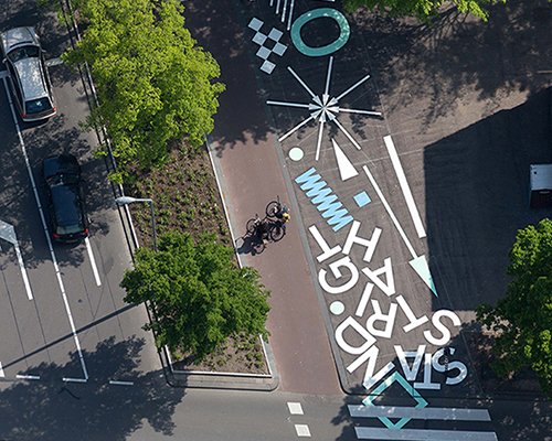 opperclaes creates colorful tactical street art in rotterdam