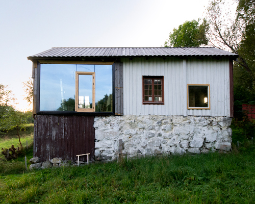 rever & drage transforms traditional norwegian dwelling into cabin retreat with scenic views