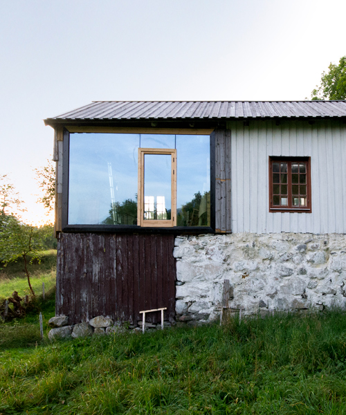 rever & drage transforms traditional norwegian dwelling into cabin retreat with scenic views