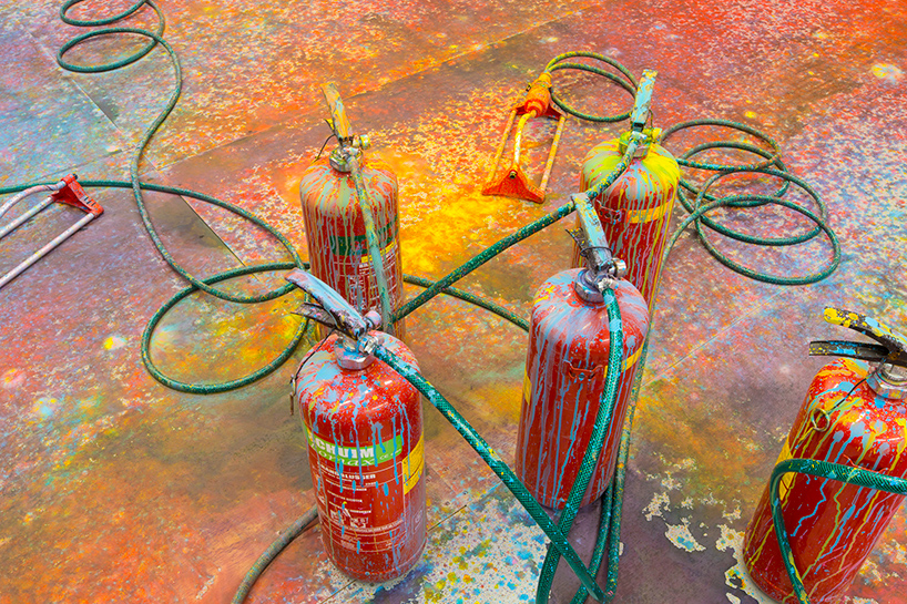 five fire extinguishers become impromptu painters in rutger de vries' 'colorscape'