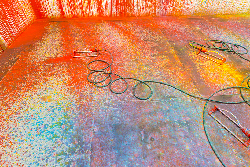 five fire extinguishers become impromptu painters in rutger de vries' 'colorscape'