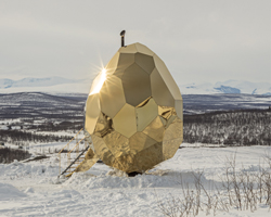 solar egg, a gold mirrored sauna in sweden by bigert & bergström