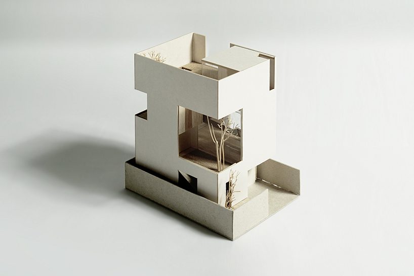 Stu/D/O architects carves openings throughout the façade of bangkok house