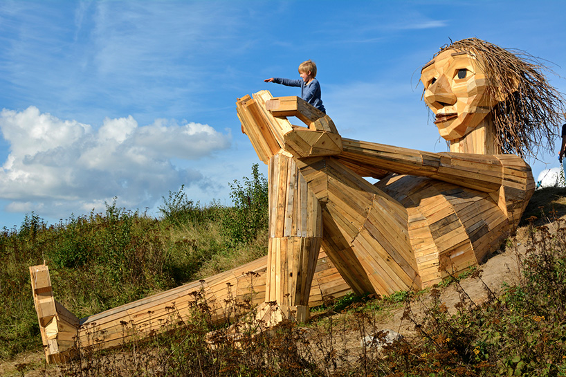 thomas dambo hides six 'forgotten giants' across the danish woodland