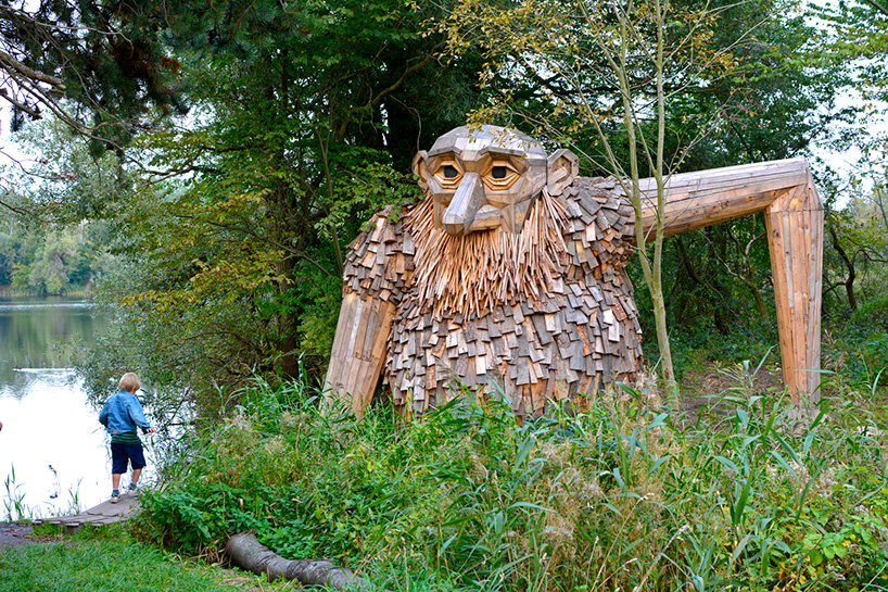 thomas dambo hides six 'forgotten giants' across the danish woodland