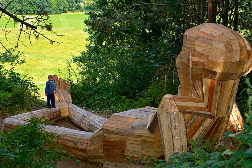 thomas dambo hides six 'forgotten giants' across the danish woodland