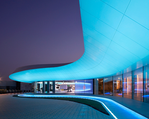 veech x veech completes news broadcasting studio in doha with sweeping canopy