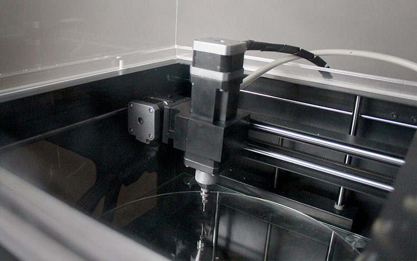 the clayXYZ is a digital 3D printer for ceramics that sits on your desktop