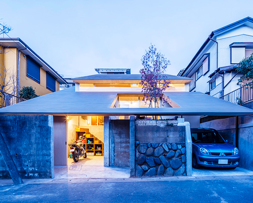 DOG architect tops house in japan with two-tier roof