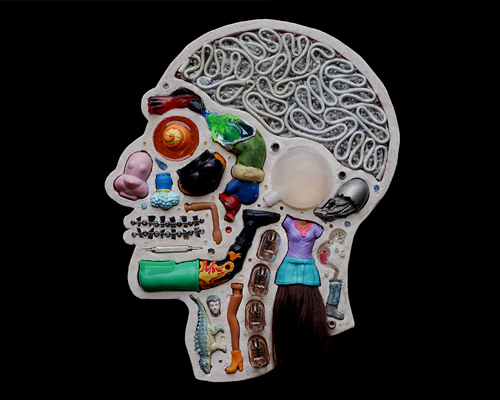 EMnXW's surrealist head sculptures are made of miscellaneous objects