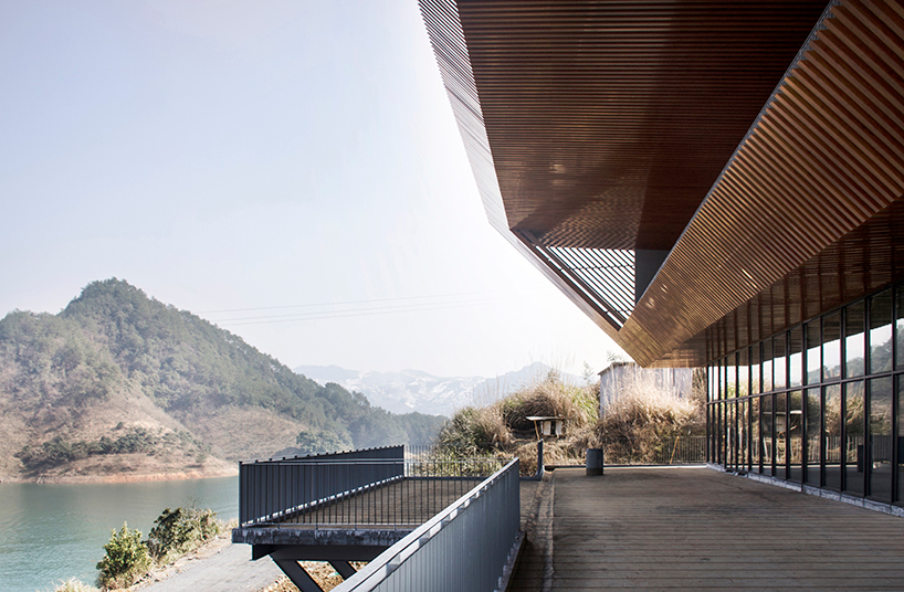 archi-union's cable car station frames the natural vista of the qiandao lake