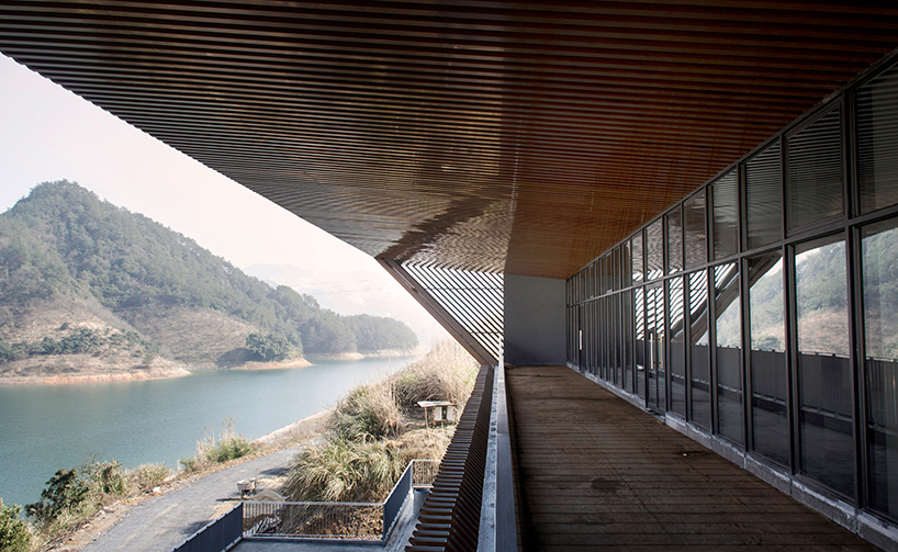 archi-union's cable car station frames the natural vista of the qiandao lake