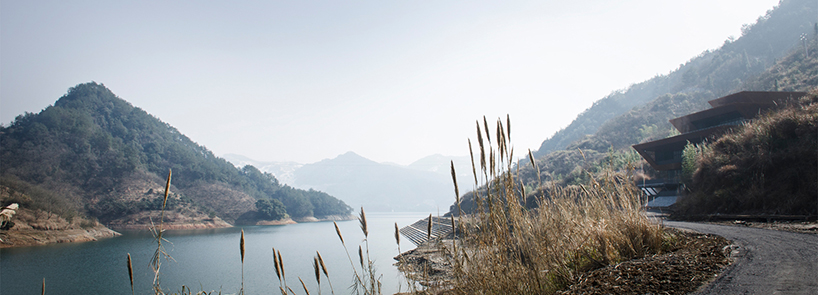 archi-union's cable car station frames the natural vista of the qiandao lake