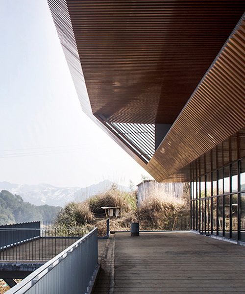 archi-union's cable car station frames the natural vista of the qiandao lake