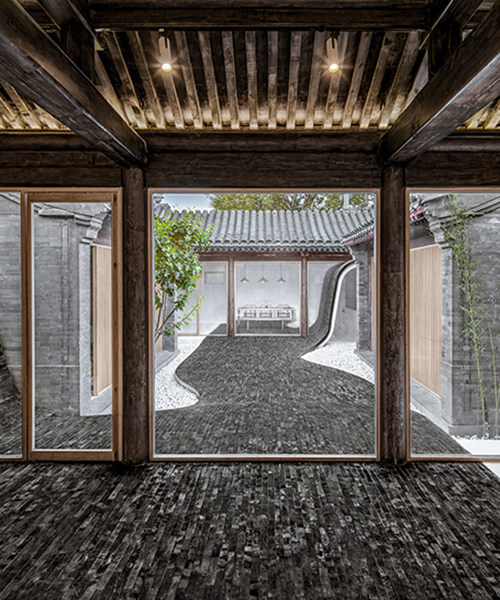 archstudio revamps traditional courtyard with a twisting brick floor design