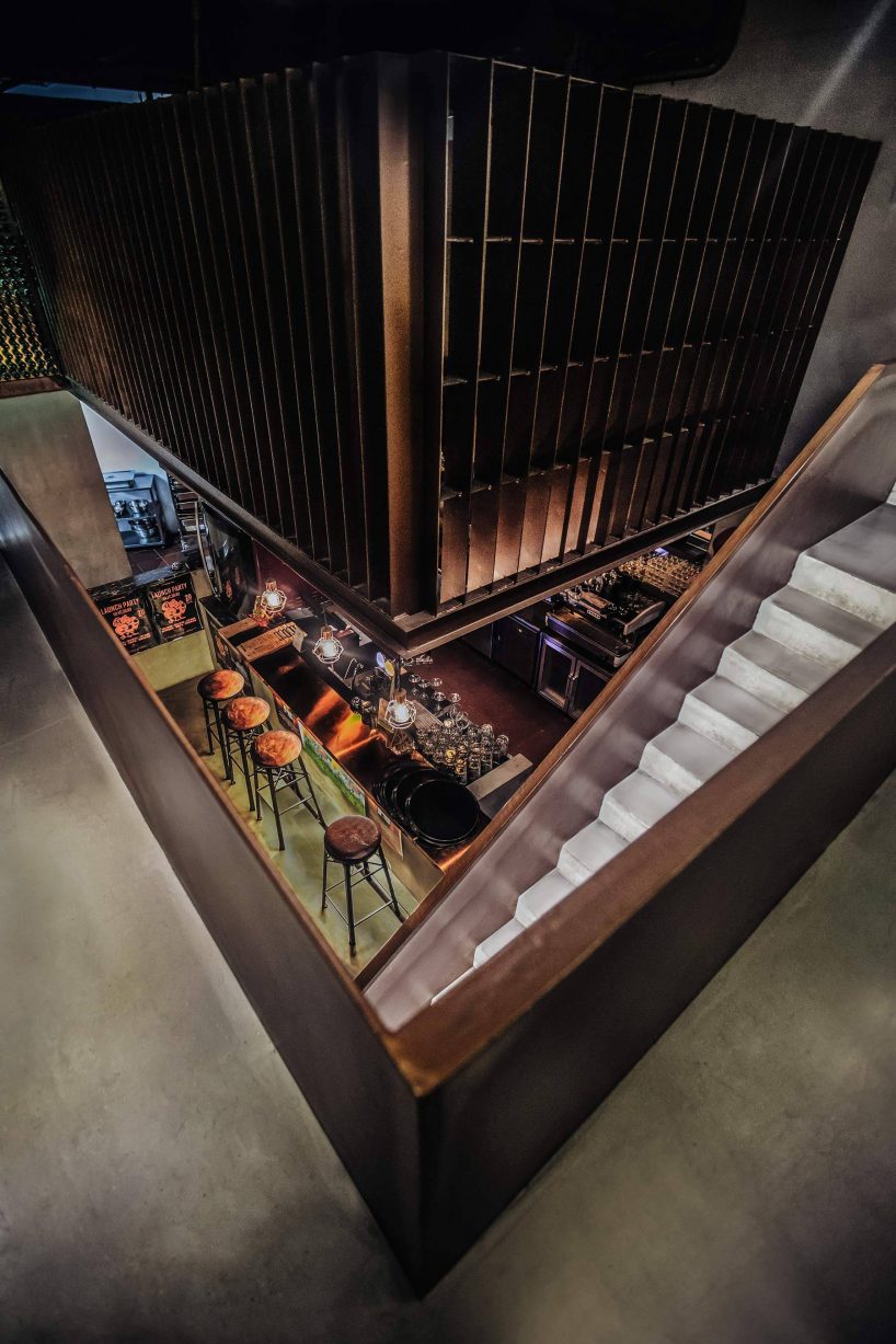 dongqi design adorns chinese eatery with suspended steel mezzanine