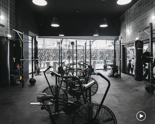estúdio AMATAM completes industrial ‘krush it’ boutique fitness club in portugal