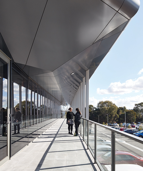 gray puksand tilts butterfly roof for peters ice cream's HQ in melbourne