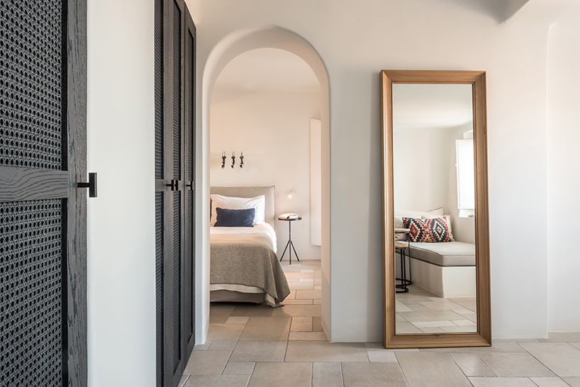 interior design laboratorium renovates scenic suites in santorini getaway