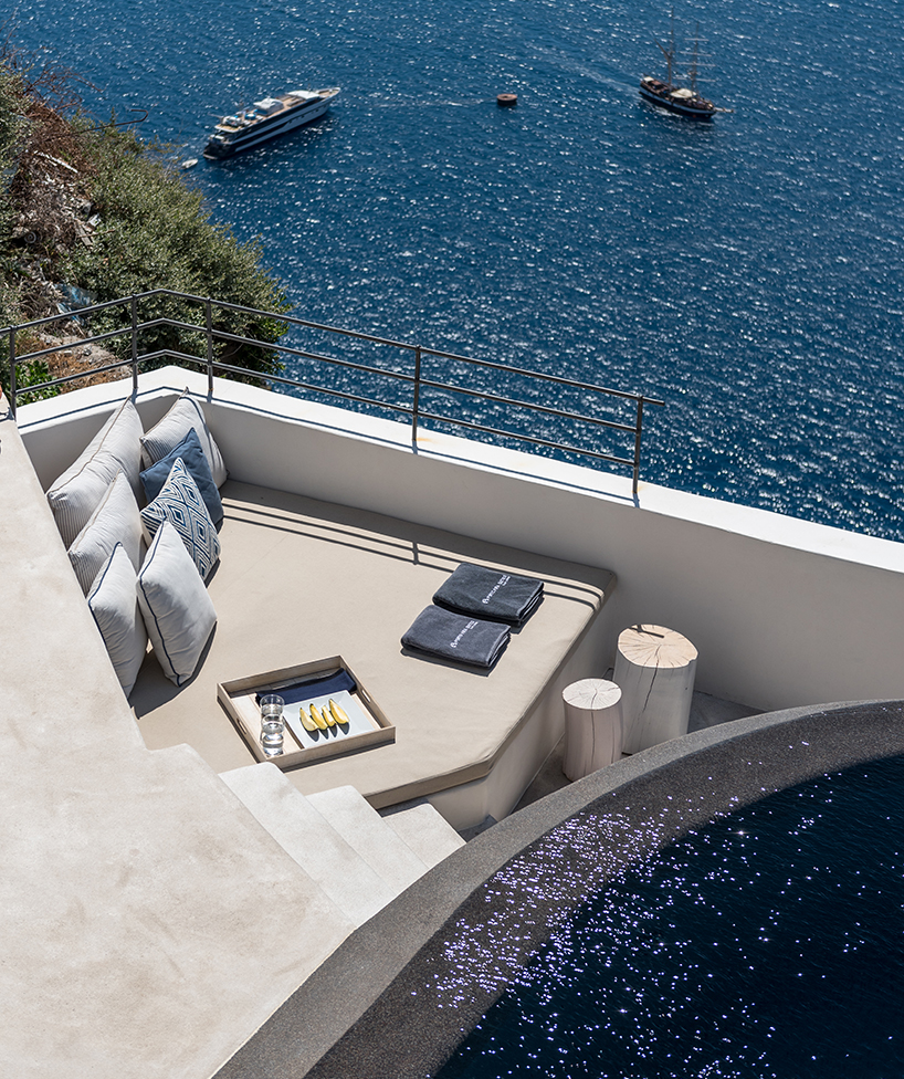 interior design laboratorium renovates scenic suites in santorini getaway