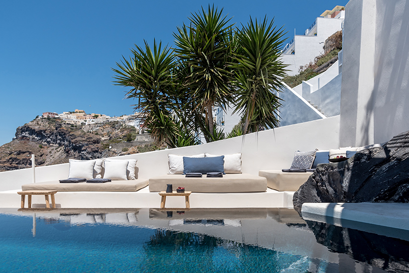 interior design laboratorium renovates scenic suites in santorini getaway