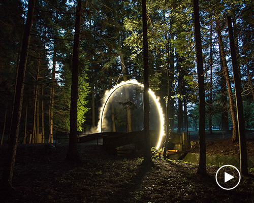 ring of mist encircles river-crossing bridge at the the japan alps art festival