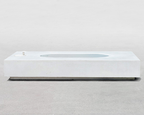 jean couvreur sculpts white concrete bench as an urban oasis